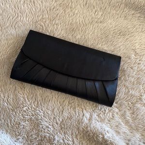 Black clutch, new never used